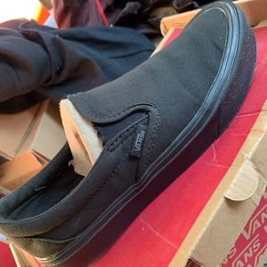 Black slip on vans, worn, women’s size 8